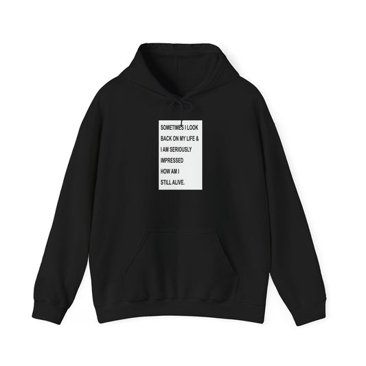 HOW AM I STILL ALIVE - Premium Unisex Funny Sarcastic Black Hoodie Sweatshirt